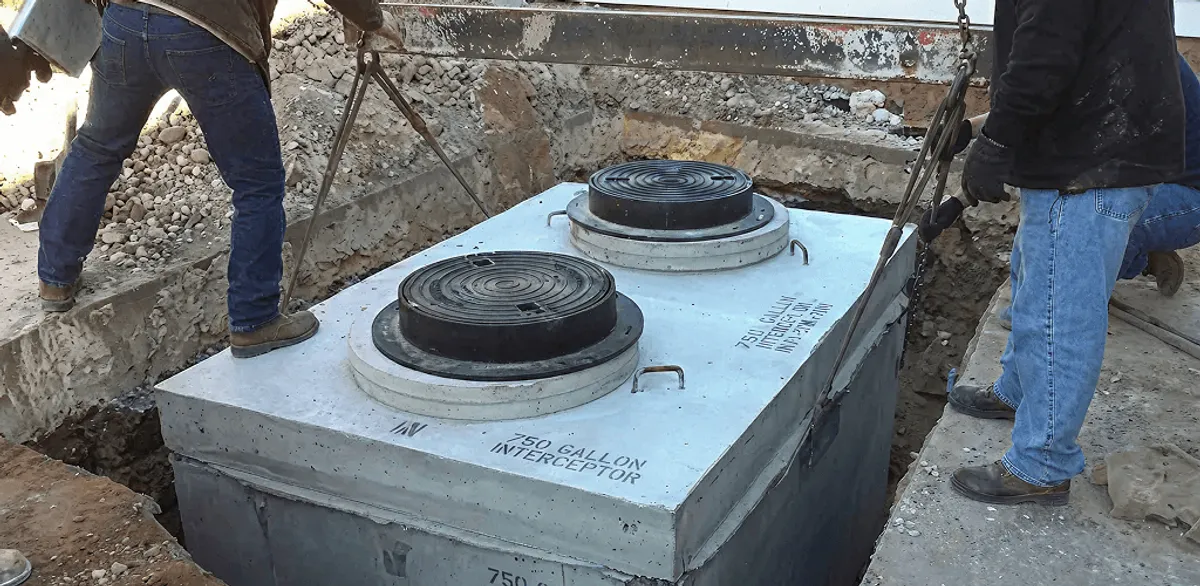 Grease trap installation for a commercial property drainage system in Duluth, MN